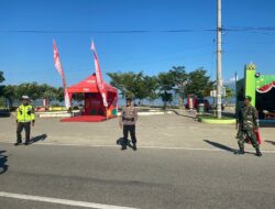 Personel Pos Pengamanan Amahami Ops Ketupat Rinjani 2024 Gatur Kendaraan di Jalur Utama Kota Bima – Sumbawa