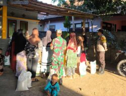 Bhabinkamtibmas Polsek Woha Laksanakan Pengamanan dan Monitoring Penyaluran Bantuan Beras Bulog