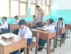 Bhabinkamtibmas Polres Bima Kota Bantu Pendistribusian Makan Bergizi Gratis (MBG) di Kecamatan Asakota