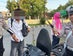 Personel Sat Lantas Amankan Pembawa Panah saat Rawan Pagi di Bima Kota